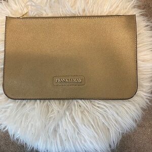 Frank Lyman Design gold clutch